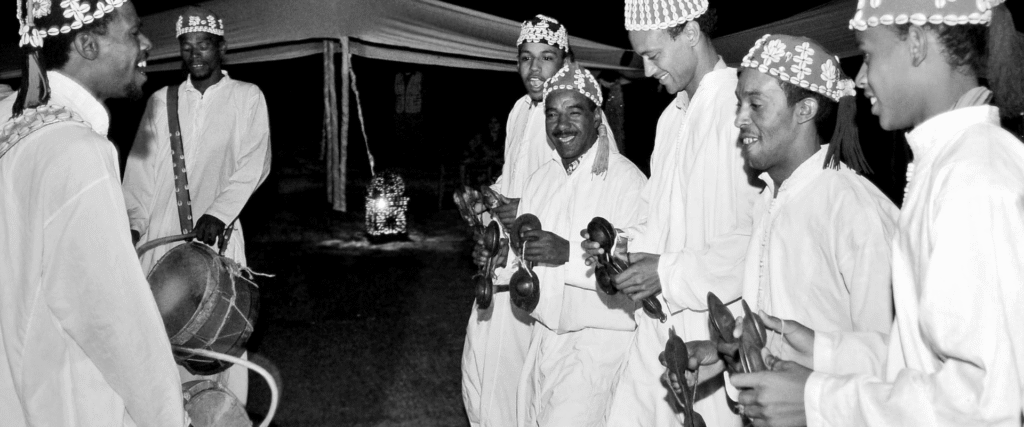 a groupe gnawa dowing a show in morocco